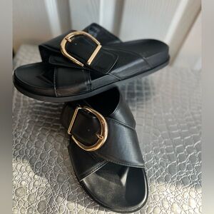 ASOS DESIGN WIDE FIT FLASH GOLD BUCKLE CROSS VAMP FLAT SANDALS IN BLACK